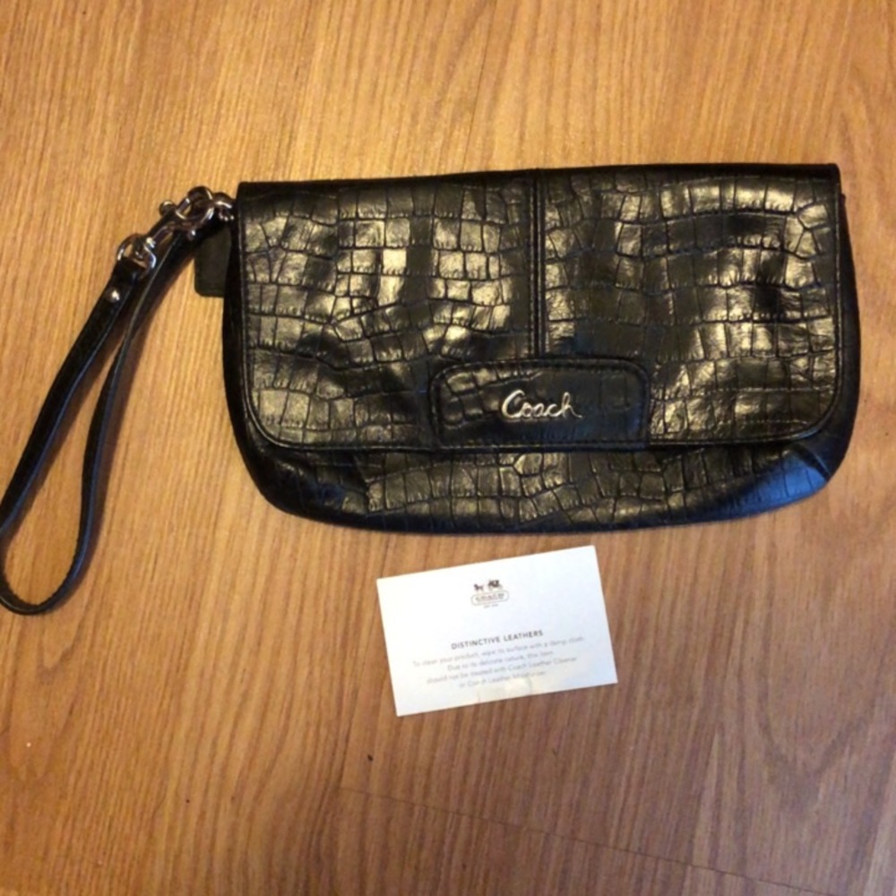 Coach embossed leather wristlet